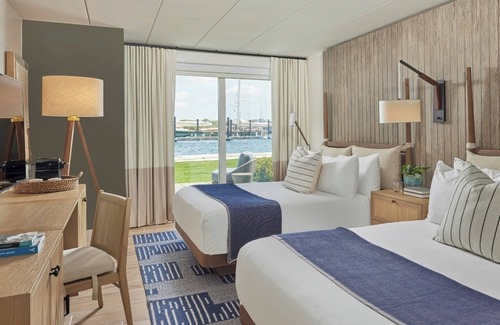 Goat Island Hotel | Tranquil Newport Getaway: Four Serene Waterview Rooms | Pets are Allowed
