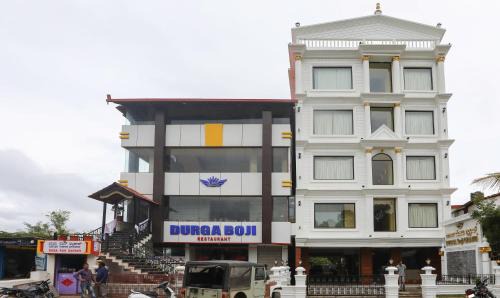 Polibetta Hotel | Treebo Durga Boji Grand, Gonikoppal Town
