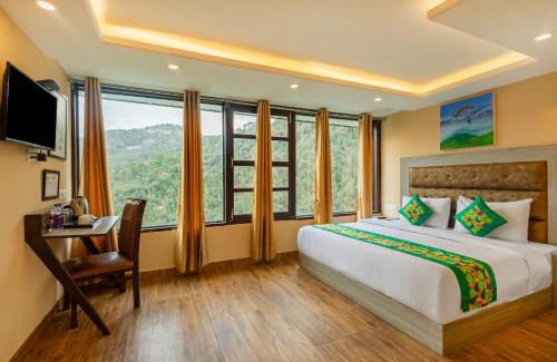 Shoghi Hotel | Treebo Lords Garden Glory - Centralized Heating