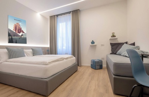Trento House | Triple room consisting of double bed and single sofa bed