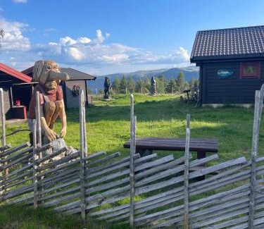 Dovre Villa | Trollvang, hytte med pool og sauna