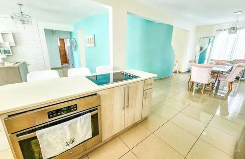 Aguadilla House | Tropical Retreat Stay-Spacious 5BR Oasis with Pool, Solar Backup, for 20 Guests!