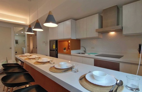Muntinlupa Resort | Tropical Scandi Condo at Exclusive Azure Urban Resort near Manila Int'l Airport