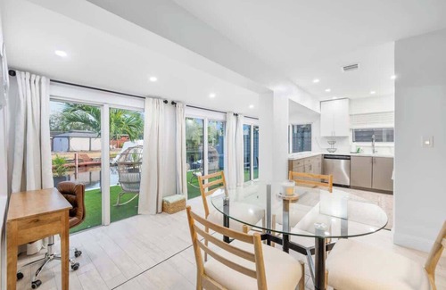 Melaleuca Gardens House | Tropical Waterfront Oasis with Hot tub Jacuzzi