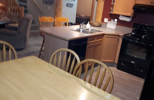 Okanagan-Similkameen Condo | True Ski In- Ski Out Condo. Family oriented space inside and out!