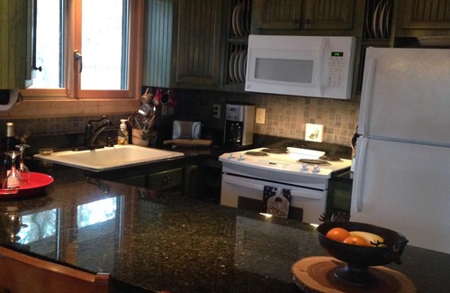 Monteagle Cabin | Tucked Inn is a cozy cabin located in Monteagle, Tennessee.