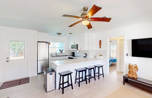 Edgewood House | Turquoise charmer with enclosed yard, open layout, & W/D - snowbird-friendly