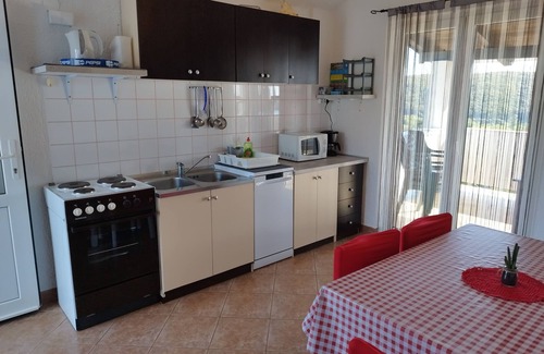 Kampor Apartment | Two bedroom apartment with terrace and sea view Kampor, Rab (A-15144-a)