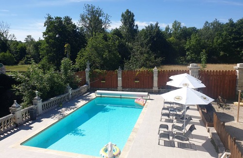 Monsec Apartment | Two bedroomed stone gite with shared pool, close to Brantome