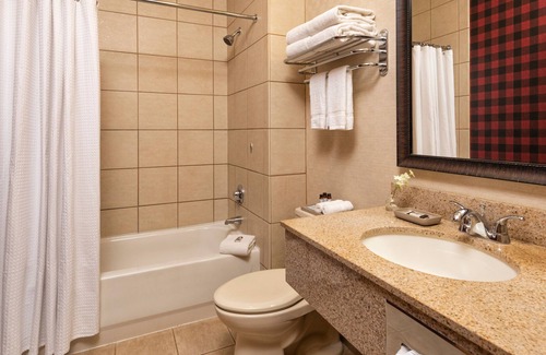 Rothschild Hotel | Two Queen Fireplace Suite With Access to Pool, Hot Tub, and Gym