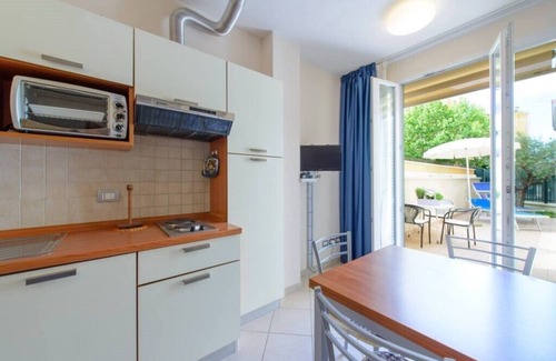 Viserbella Apartment | TWO-ROOM APARTMENT 20 meters from the sea with courtyard, in Viserba, with covered parking.