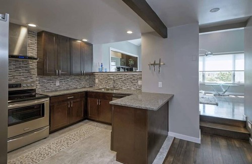 Downtown Wilmington Condo | Two-story condo in luxury townhouse. Free parking.