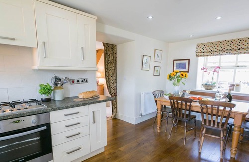 Pentraeth Cottage | Ty Gwair - a cosy fire that sleeps 4 guests in 2 bedrooms