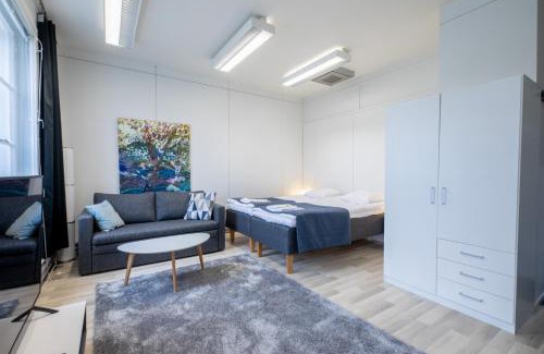 Varkaus Apartment | Tyylikäs City studio, Terassi ja ilmainen parkki Vanha Postitalo