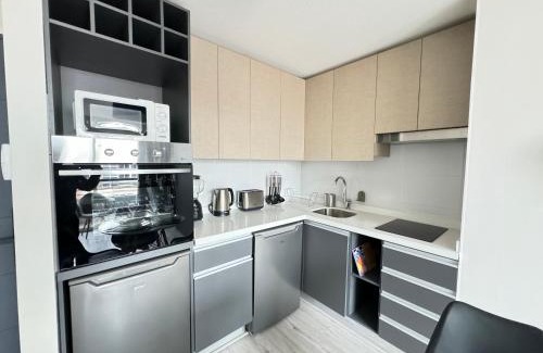 Downtown Santiago Apartment | U509 - Relax céntrico en Santiago con Gym y Piscina
