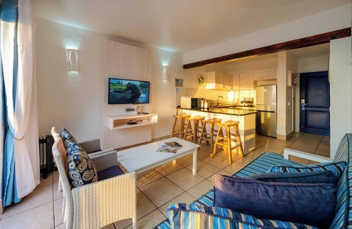 Mykonos Apartment | Ultimate Coastal Escape | Patio & Resort Perks