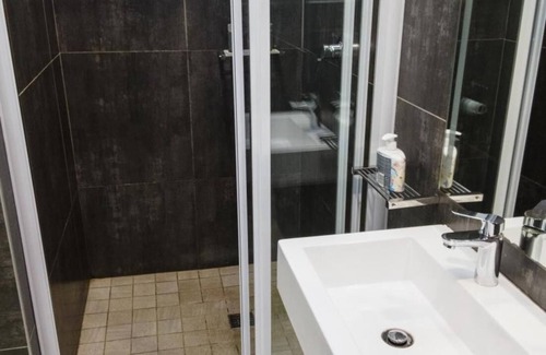 La Lucia House | Umhlanga Lodge Room leads of a shared kitchenette and dining room
