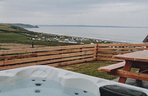 Penycwm Apartment | Unforgettable sea views, Hot tub, Modern property