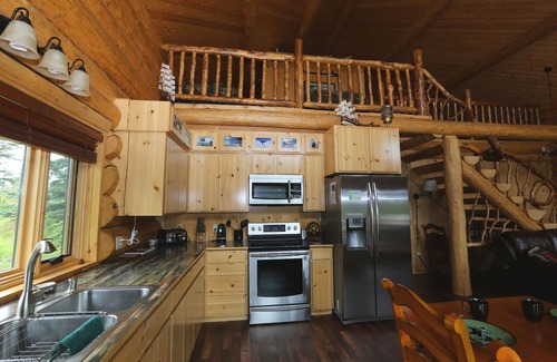 Anchor Point House | Unique Alaskan log home in trees & wild flowers on 14-acre private homestead.