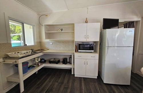 Cape Gloucester House | UNIT 4. SUNSET BEACH BUNGALOWS, CAPE GLOUCESTER. ABSOLUTE BEACHFRONT