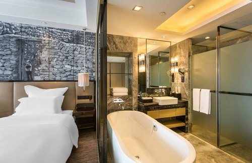 Xinshi District Hotel | Universal Hotel Urumqi