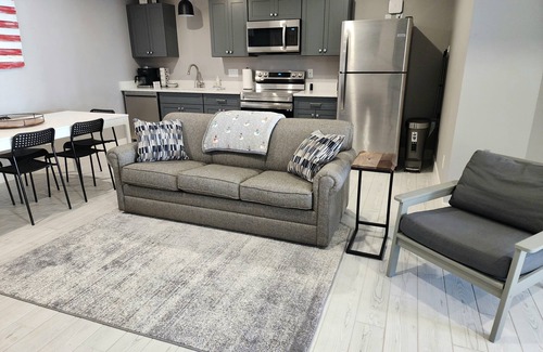 Mancelona Condo | Unpack and relax with a Mountain view. New! Sleeps 6 Pools, New construction.