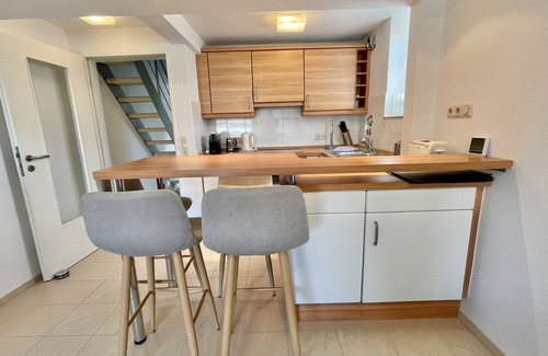 Langeoog Apartment | Unser Lichtdurchflutetes Sonnennüst im Obergeschoß am Langeooger Ortsrand