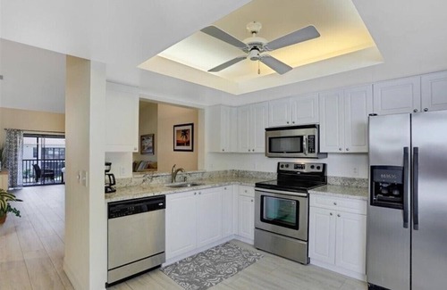 Pelican Bay Condo | Updated Pelican Bay Condo Near Beach and Overlooking Pool/Tropical Gardens.