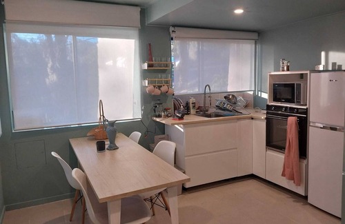 Central Coast Apartment | Urban Mini-Farm 2bm, 1 bath, kitchen, laundry, and dining.