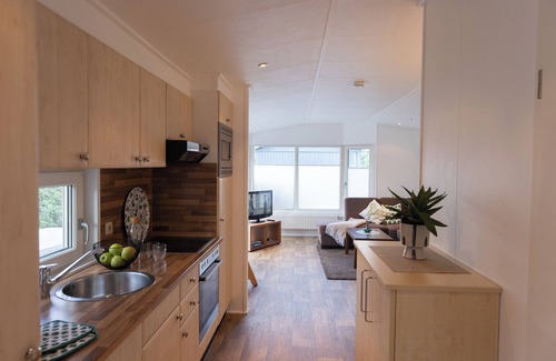 Dorumer Neufeld House | Vacation bungalow Mellumplate 12 with sun terrace and ground floor