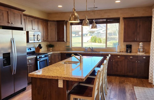 Washington County House | Vacation home opens up directly to the heated pool and open park!