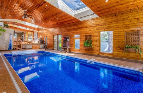 Northwest Calgary House | Vacation home with an Indoor Pool