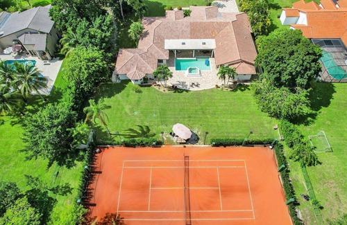 Survey Creek House | Vacation Tennis House with Euro Red Clay Tennis Court! Discounted Summer Rates!