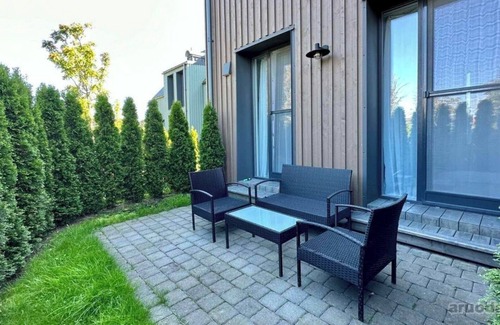 Palanga Apartment | Vaivorykstes Namai with Heated Pool by Hostlovers