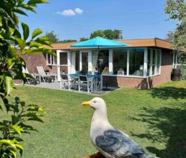 Warmenhuizen House | Vakantiebungalow in Riviera Maison stijl nabij zee en strand, bos en duin
