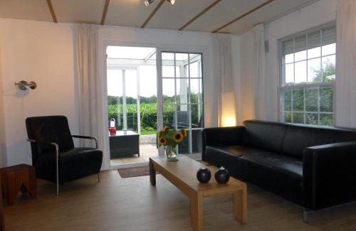 Oisterwijk Ski Chalet | Vakantiehuis Appelvink, Toplocatie in bosrijke omgeving