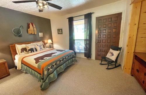 Red River House | Valley Condo 117 - Creekside - WiFi - Hot Tub - Fireplace - Washer - Dryer - Playground