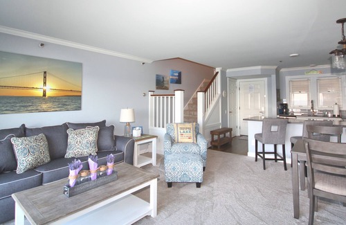 Boyne City Condo | Vaulted Ceilings + Prime Lake Charlevoix Views | Fireplace | Private Patio|