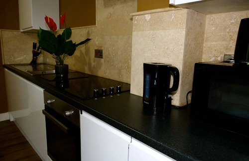 Rotherham Apartment | Versace Gold Apartment Opulence