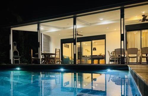 Boucan Canot Villa | VILLA Ô 3 CAP - Magnifique Villa - classée 4 étoiles - Piscine CHAUFFEE - 4 ch - 8 personnes - accès direct à la plage et à l'esplanade de BOUCAN CANOT