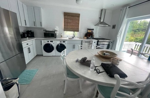 Rock Sound House | Villa De La Rose - A Stylish Escape! Enjoy sunset dinners.