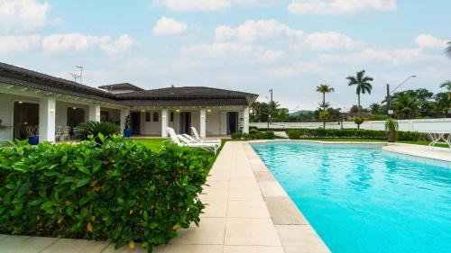 Peninsula House | Villa Jardim Acapulco - Guarujá - Praia de Pernambuco