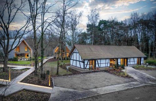 Zolder Villa | Villa Lodge met Jacuzzi - 8 personen - Woodz Lodges