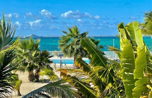 Nettle Bay Villa | Villa Paradis Bleu Maison sur la plage, 2 chambres, piscines, tennis