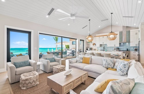Tar Bay Villa | Villa Summerwinds, Beachfront on Flamingo Bay, Heated Pool + Carriage Home.