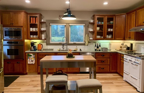Graton House | Vineyard property with a 1910 Farmhouse and Water Tower