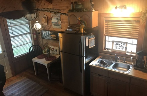 Hawkins Cabin | Vintage Cottage on Lake! Fish Camp Cabin FREE kayak, canoe & bike use!