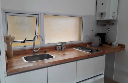 Macrozona Bahia Redonda y Primeros Faldeos Apartment | Warm and modern apartment with lake view