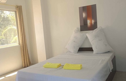 Badian House | WARM Tourist Inn offers you a privileged experience comfort.