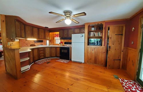 Bryant Pond Cabin | Waterfront and Mountain view a HOT TUB, Unlimited KARAOKE and Pet Friendly!